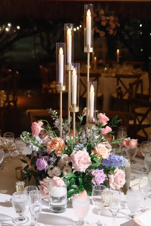 Candlelit floral centerpiece at Longan’s Place