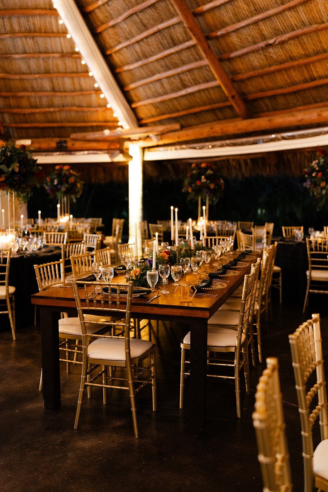 Long reception table with warm lighting