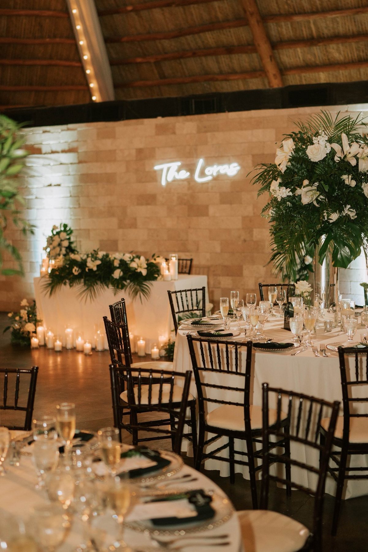Reception tables and sweetheart table inside Longan’s Place